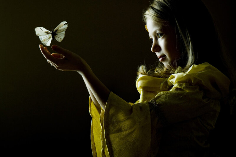 Girl Holding Butterfly — Black