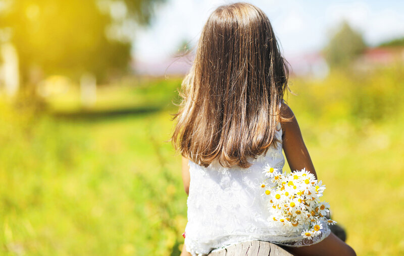Girl Holding Daisies — Green