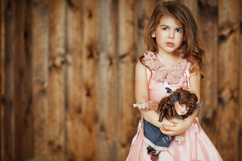 Girl Holding Doll — Pink, Calm, Photograph