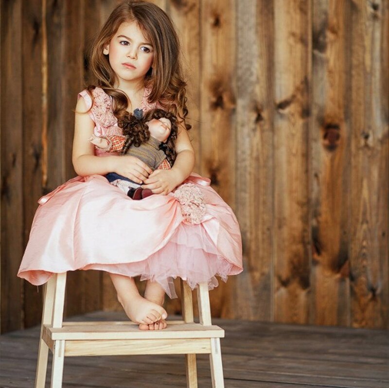 Girl Holding Doll — Pink, Calm