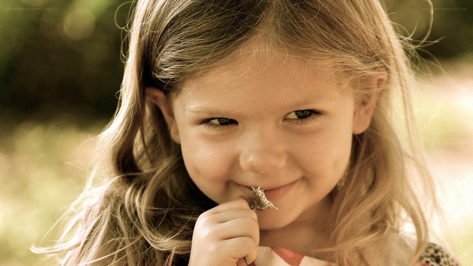 girl holding flower