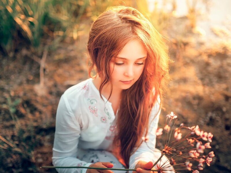 Girl Holding Flowers — Brown