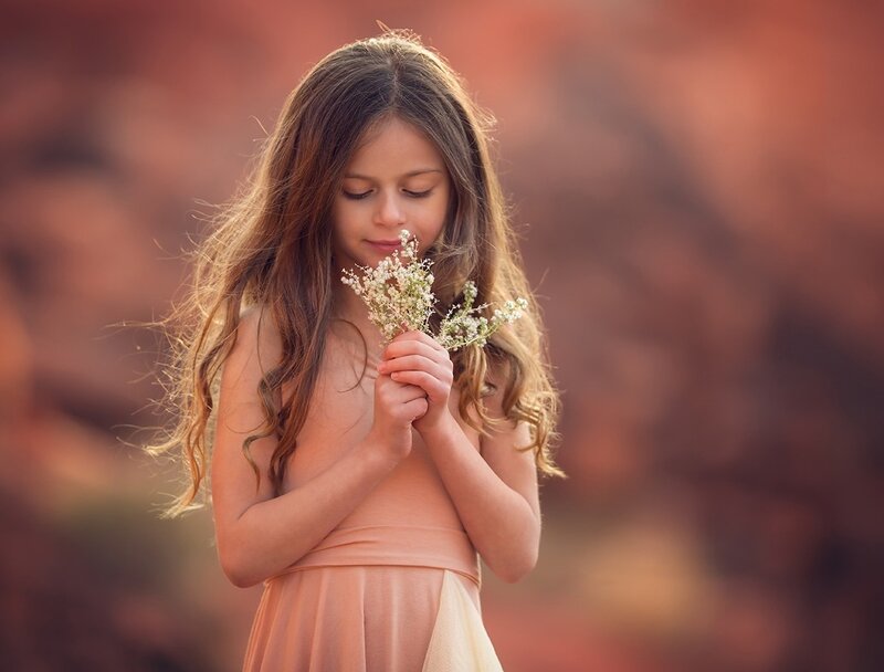 Girl Holding Flowers — Pink, Serene, Sunset