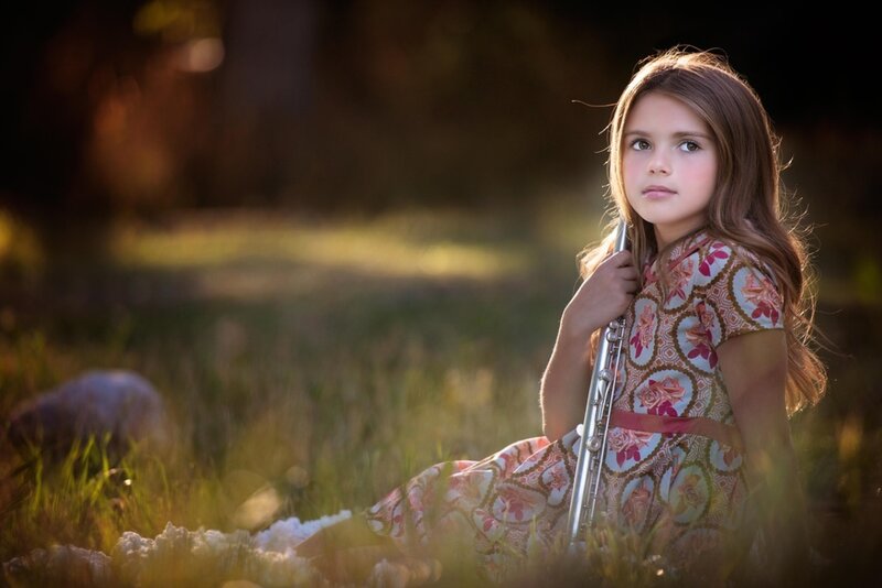 Girl Holding Flute