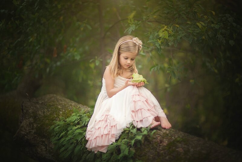 Girl Holding Frog