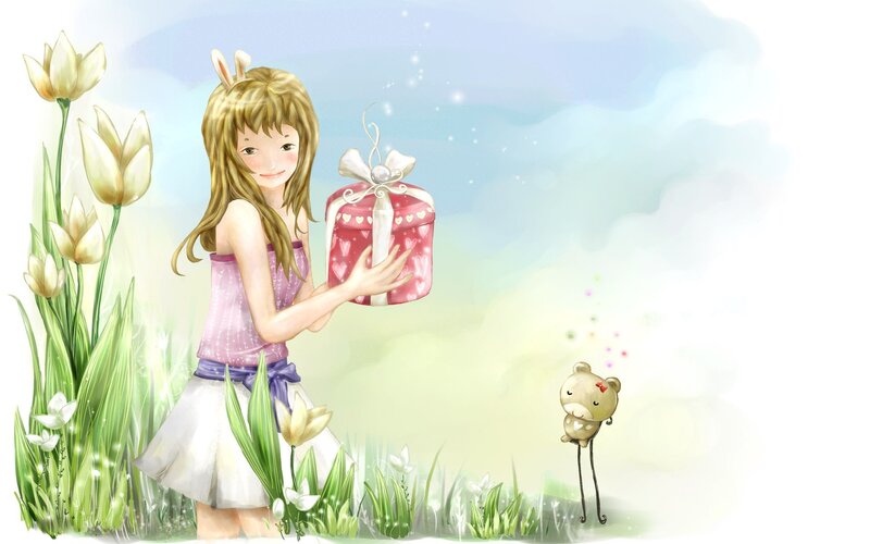 Girl holding gift in garden