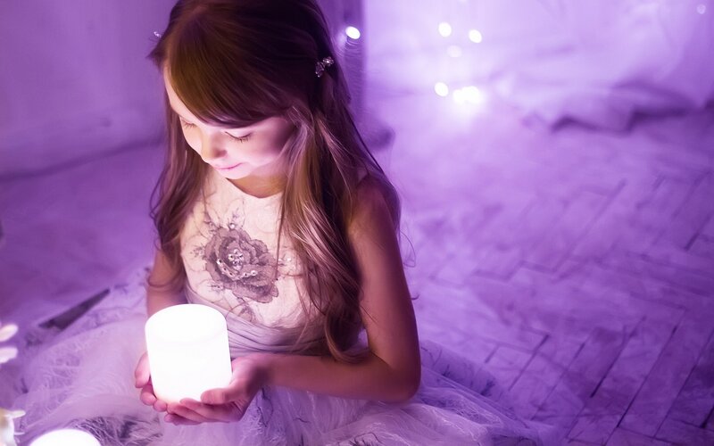 Girl Holding Glowing Lamp — Purple