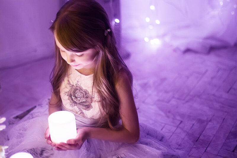 Girl Holding Glowing Lamp