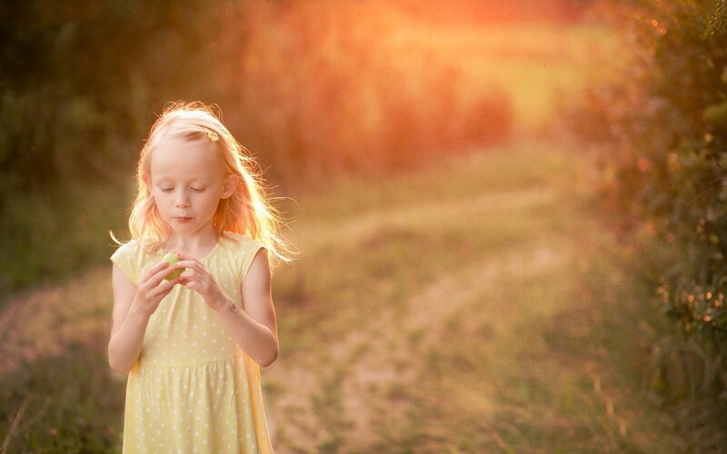 Girl Holding Green Apple