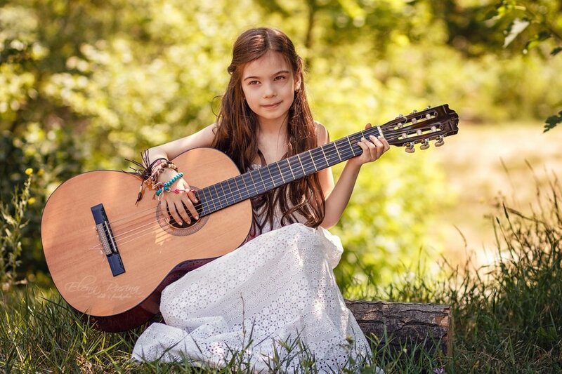 Girl Holding Guitar — Green