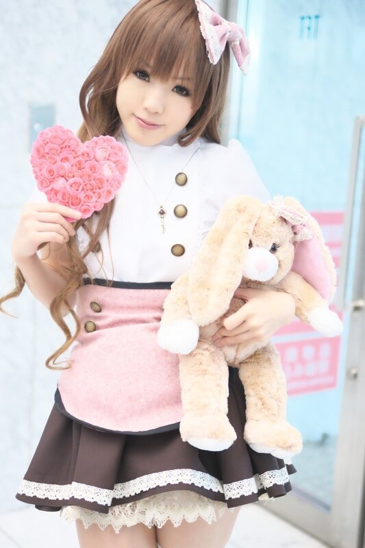 girl holding heart and bunny