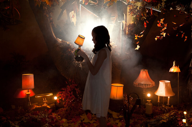 Girl Holding Lamp