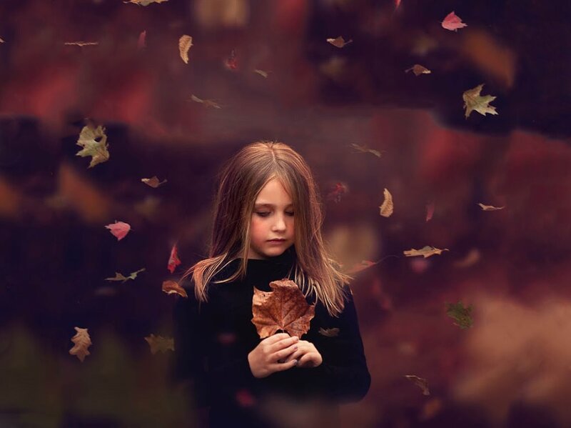 Girl Holding Leaf — Brown