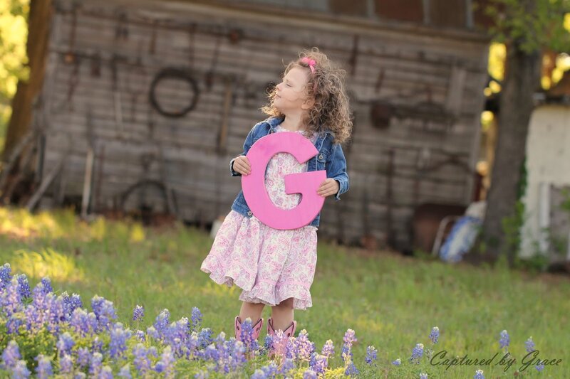 Girl Holding Letter G