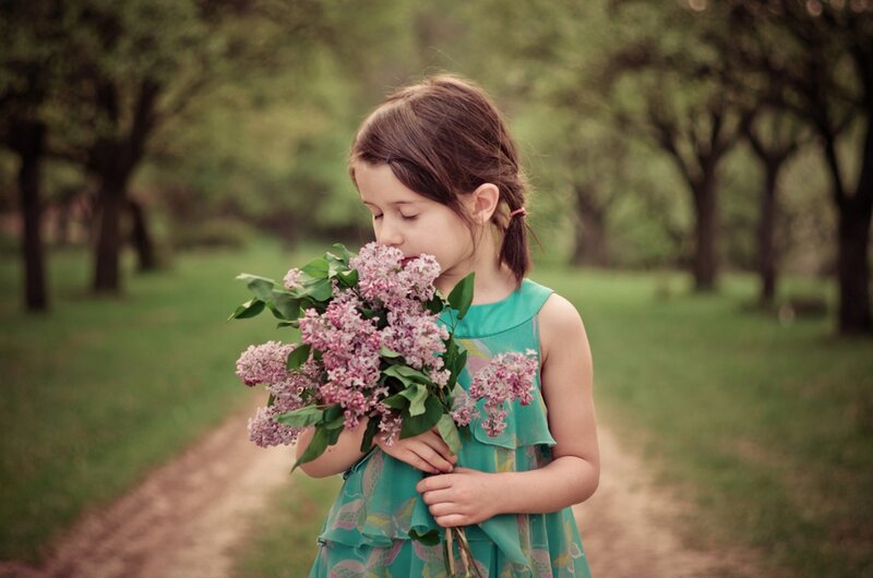 Girl Holding Lilac Bouquet