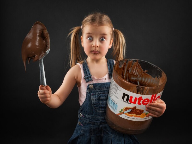 Girl Holding Nutella