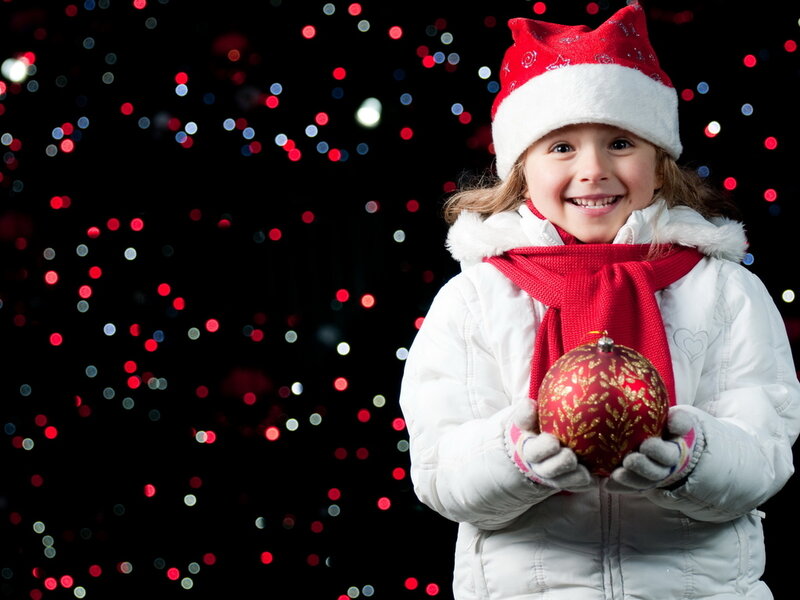 Girl Holding Ornament — Red