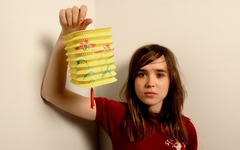 Girl Holding Paper Lantern — Yellow