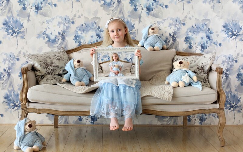 Girl Holding Photo