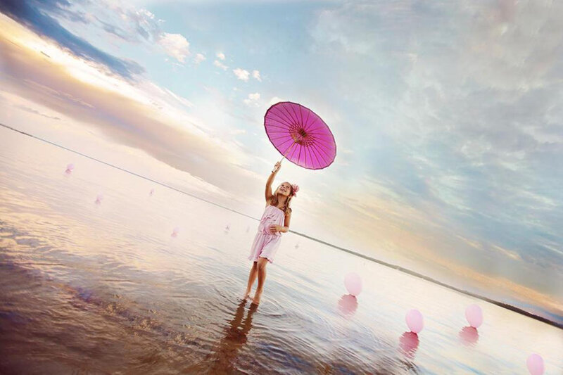 Girl Holding Pink Umbrella