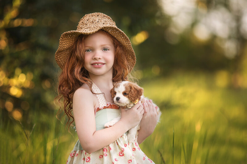 Girl Holding Puppy — Green, Serene