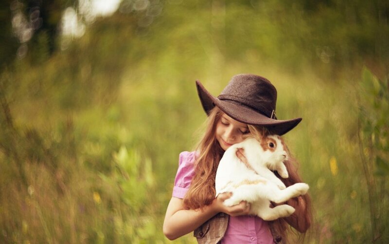 Girl Holding Rabbit — Green, Serene, Afternoon, Photograph, Hat