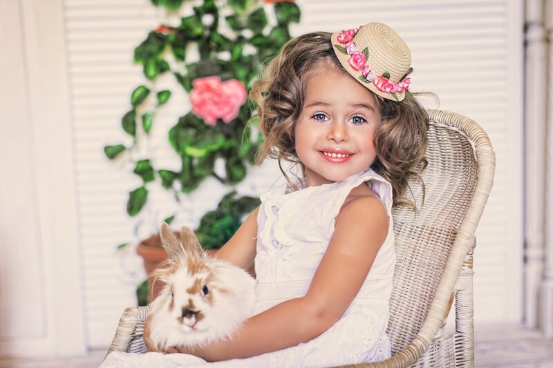 Girl Holding Rabbit — White, Cheerful