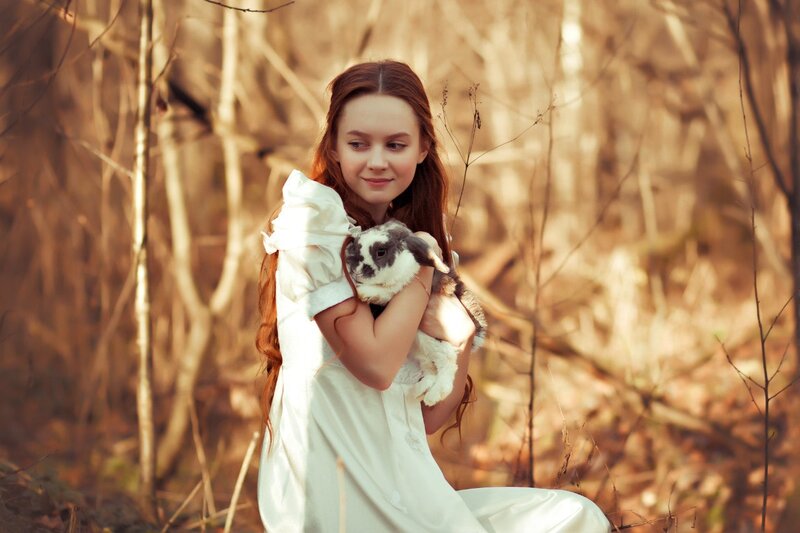 Girl Holding Rabbit — White, Serene