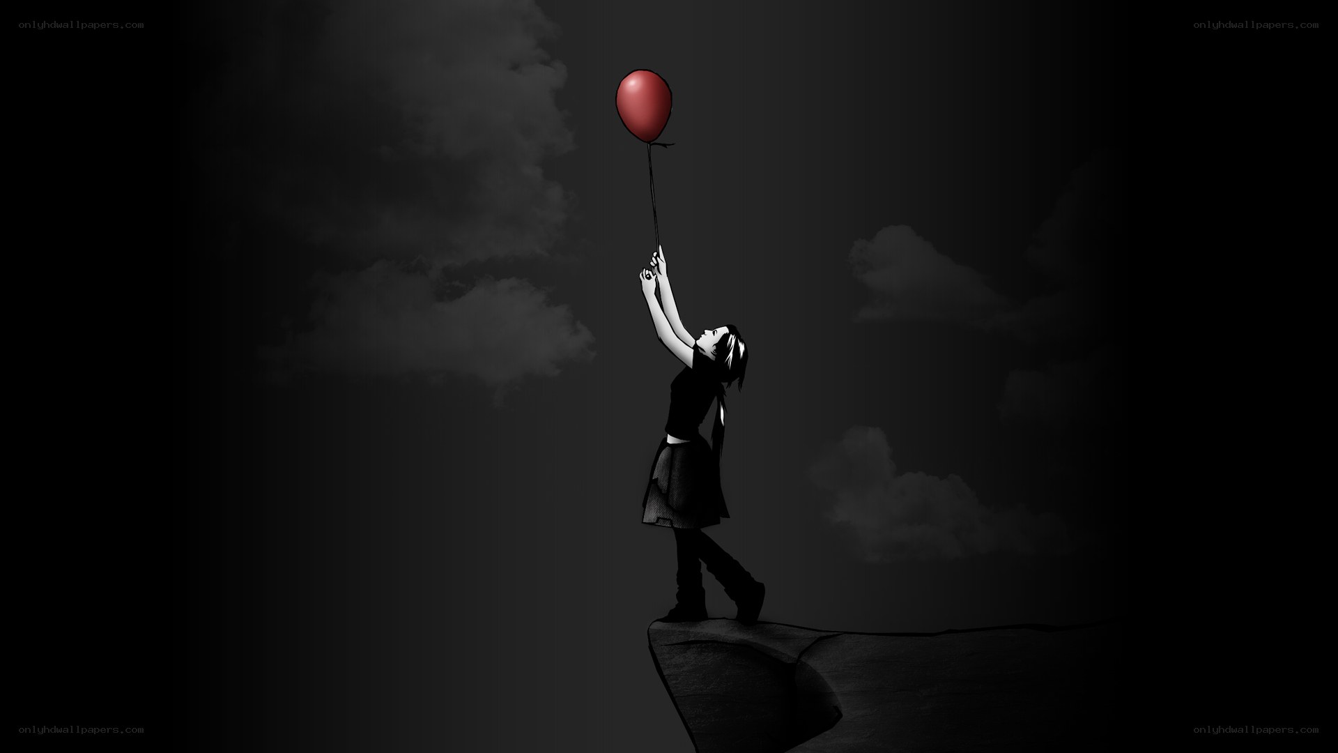 Girl holding red balloon