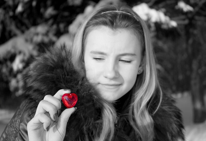 Girl Holding Red Heart