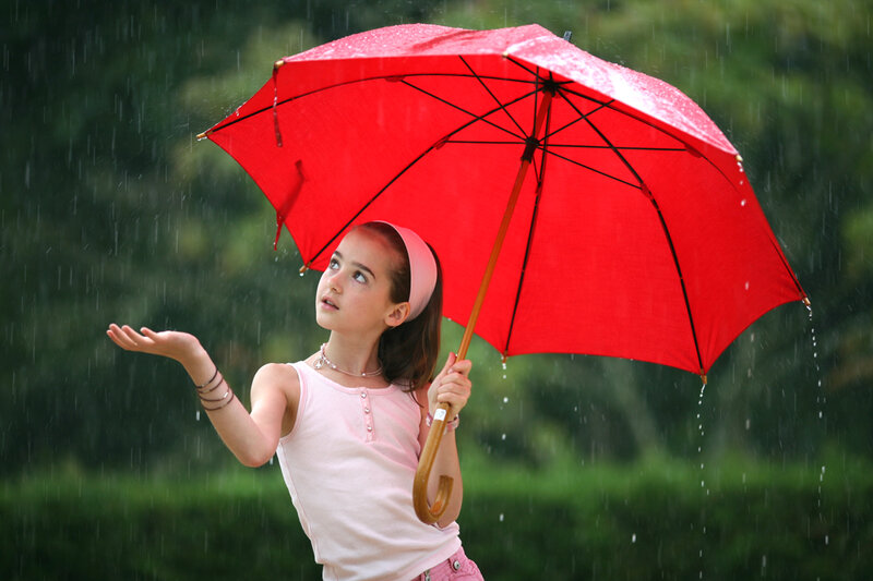 Girl Holding Red Umbrella