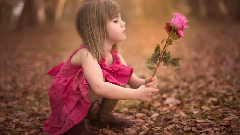 Girl Holding Rose — Pink, Serene