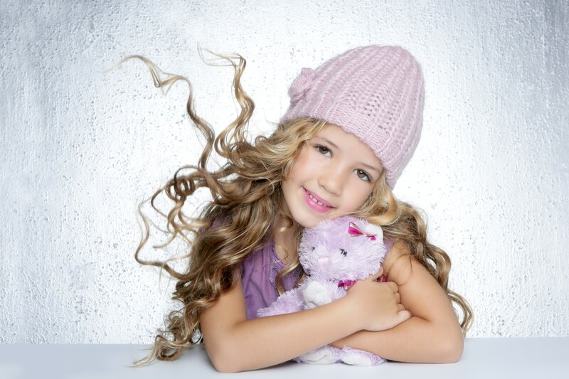 Girl Holding Stuffed Animal — Pink