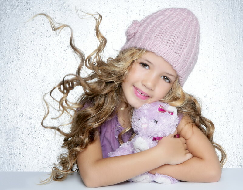 Girl Holding Stuffed Animal