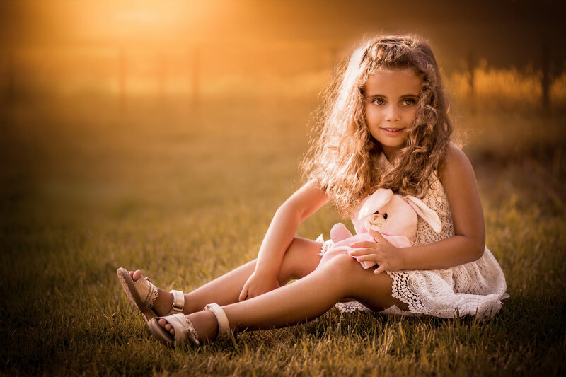 Girl Holding Stuffed Bunny