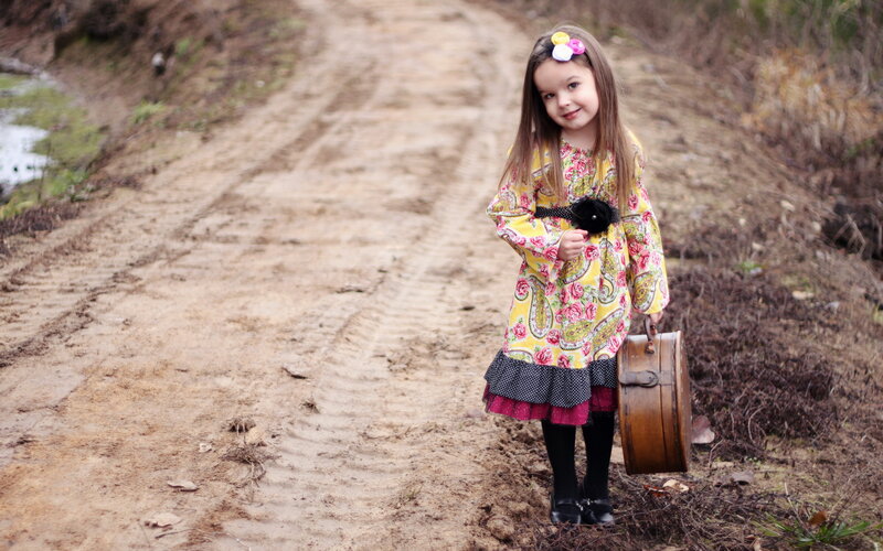 Girl Holding Suitcase