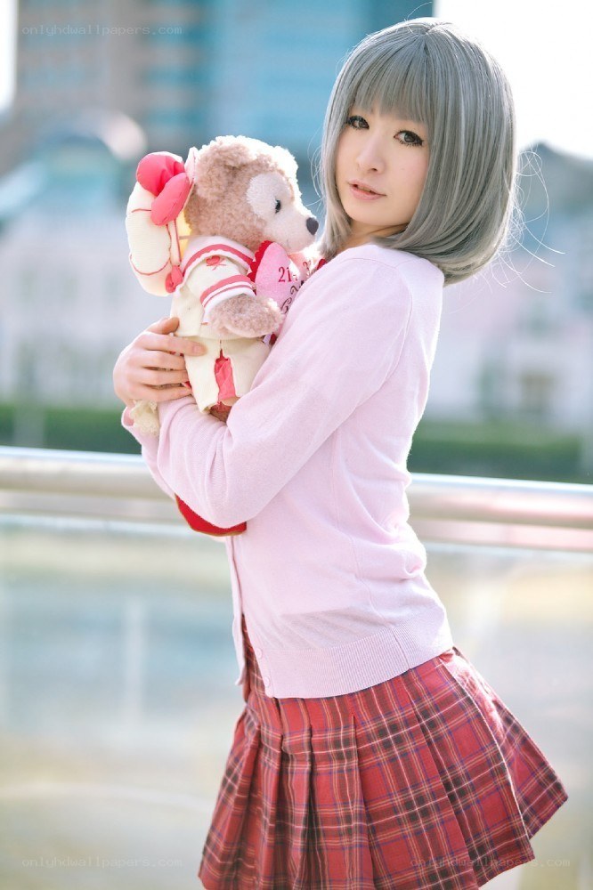girl holding teddy bear