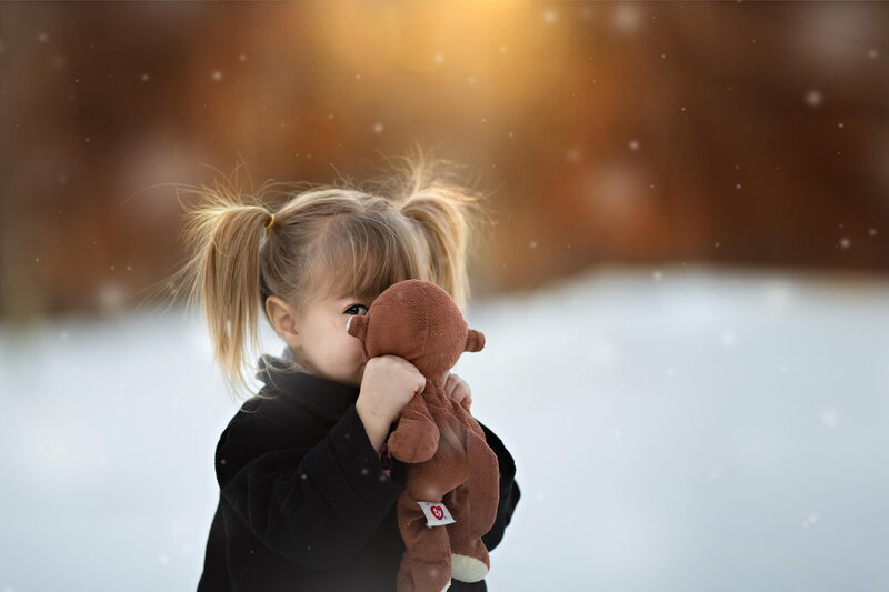 Girl Holding Teddy Bear — Brown, Calm