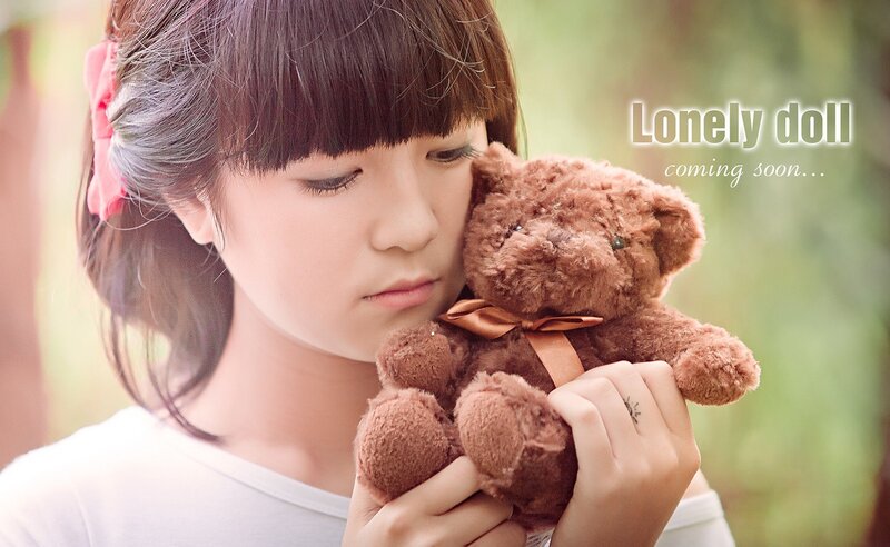 Girl Holding Teddy Bear — Brown, Melancholic, Photograph, Teddy Bear