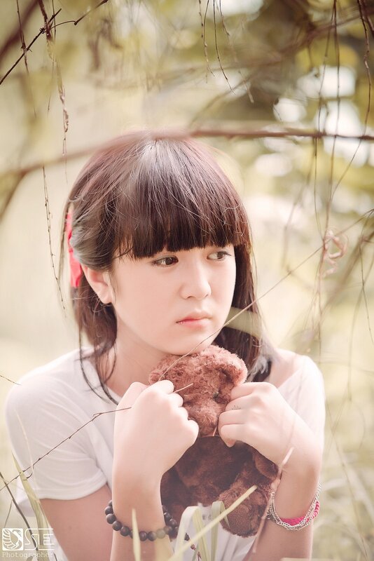 Girl Holding Teddy Bear — Brown, Serene, Afternoon, Photograph