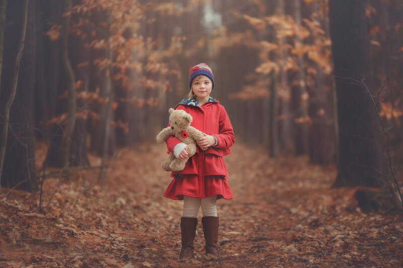 Girl Holding Teddy Bear — Red, Serene