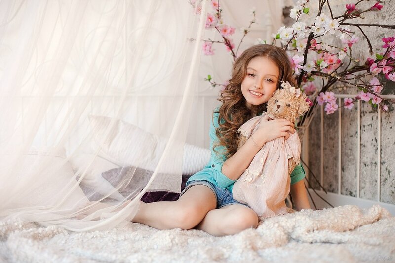 Girl Holding Teddy Bear — White, Serene