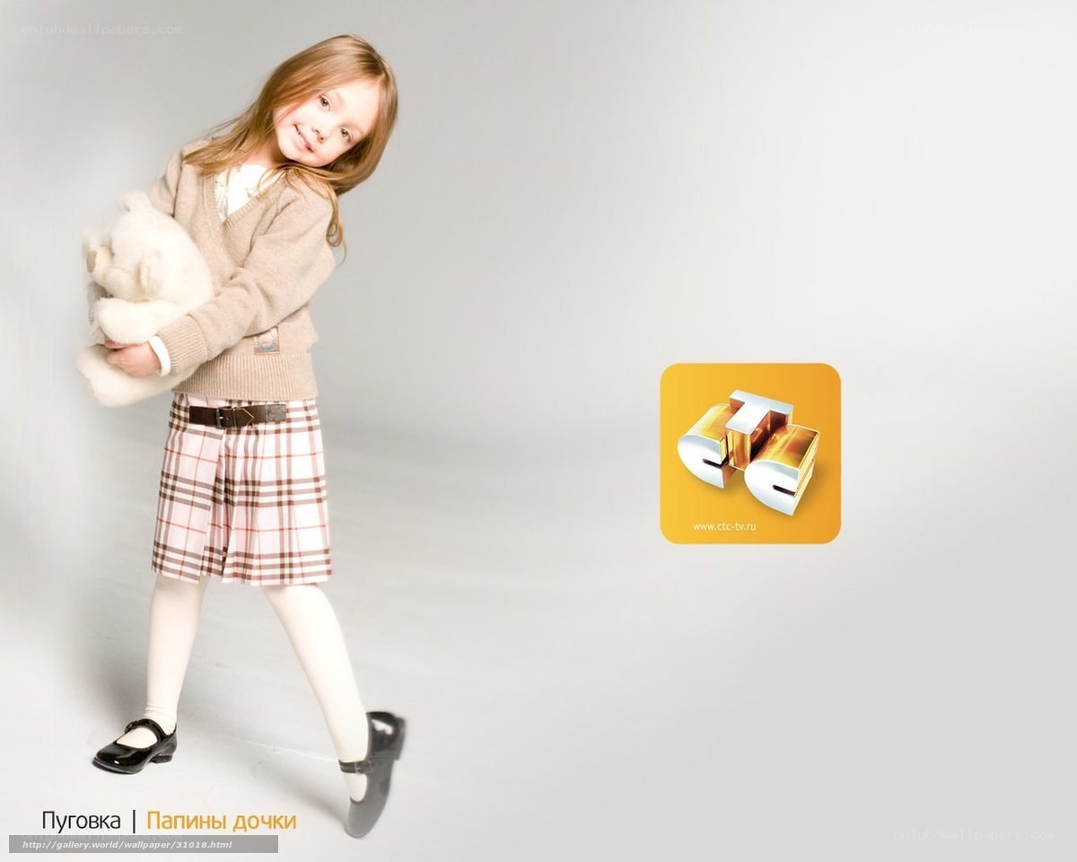 Girl holding teddy bear