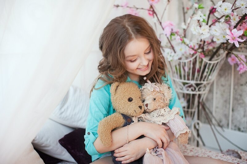 Girl Holding Teddy Bears — Blue