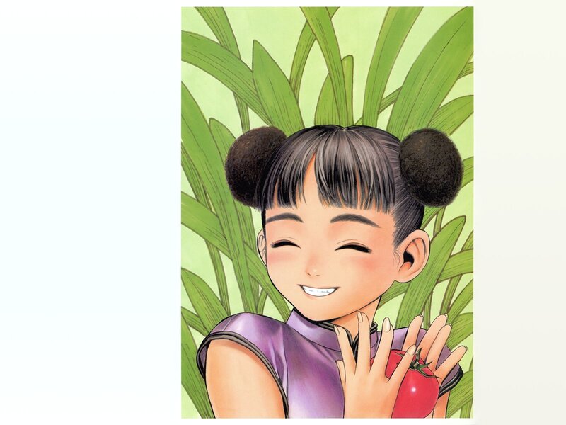 girl holding tomato in garden