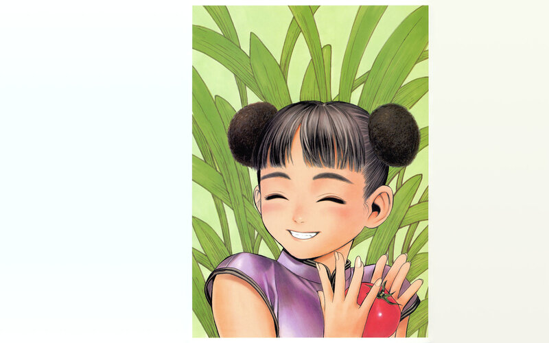 girl holding tomato in garden
