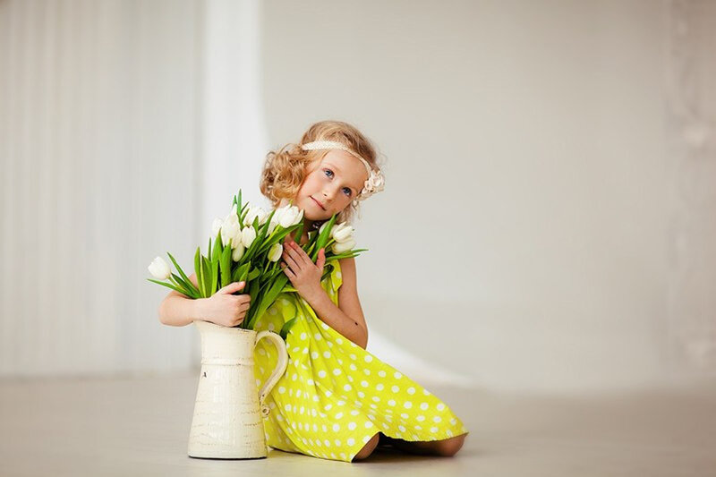 Girl Holding Tulips — Yellow, Serene