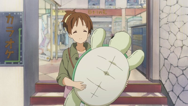 Girl Holding Turtle Plush