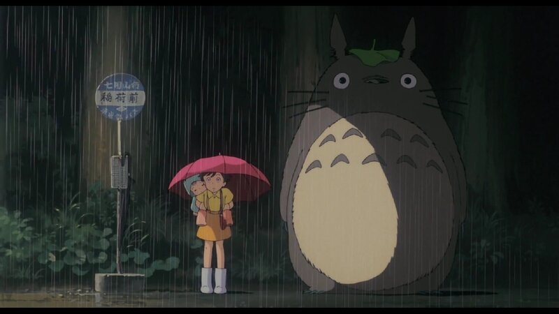 Girl Holding Umbrella in Rain