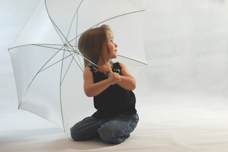 Girl Holding Umbrella